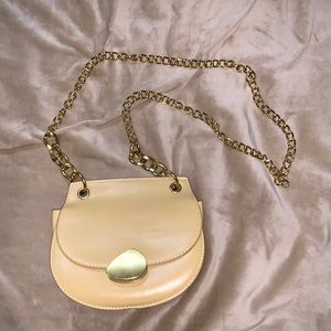 Brand new beige purse with gold chain